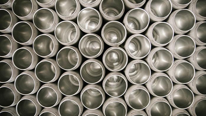 The aluminium can: from flat line to flat out